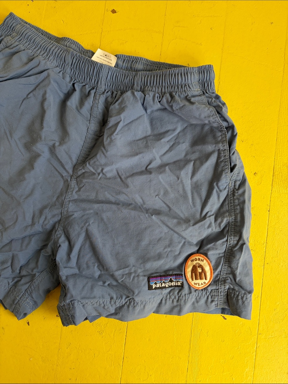 Patagonia Slate Blue Athletic Shorts with Worn Wear Patch